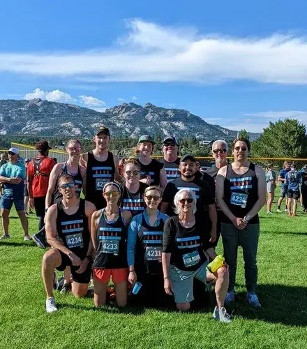 A group wearing their vacation shirts A group wearing their vacation shirts