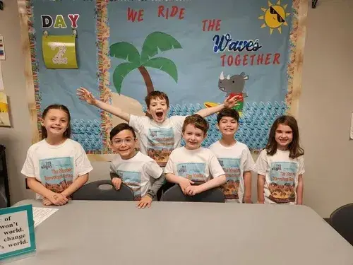 Kids wearing their vacation shirts Kids wearing their vacation shirts